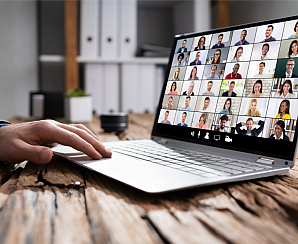 Image of person's hand on a laptop